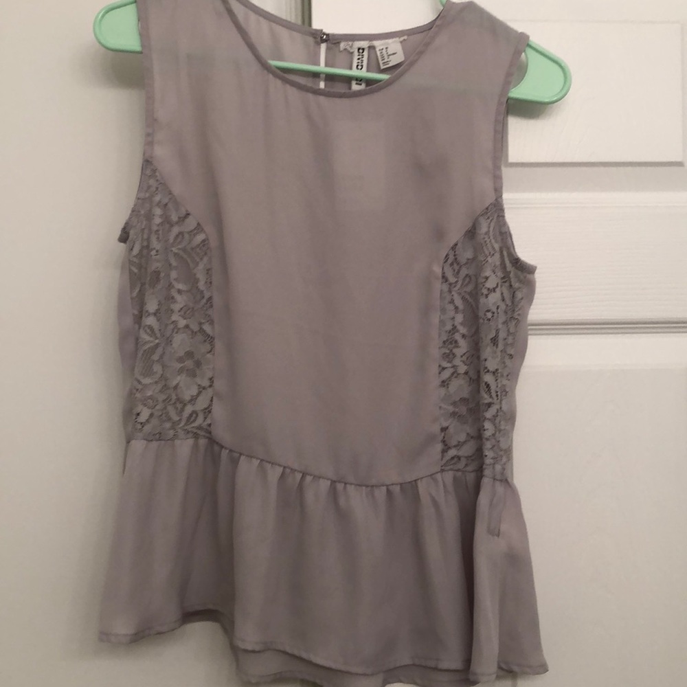 grey blouse with peplum and lace detail